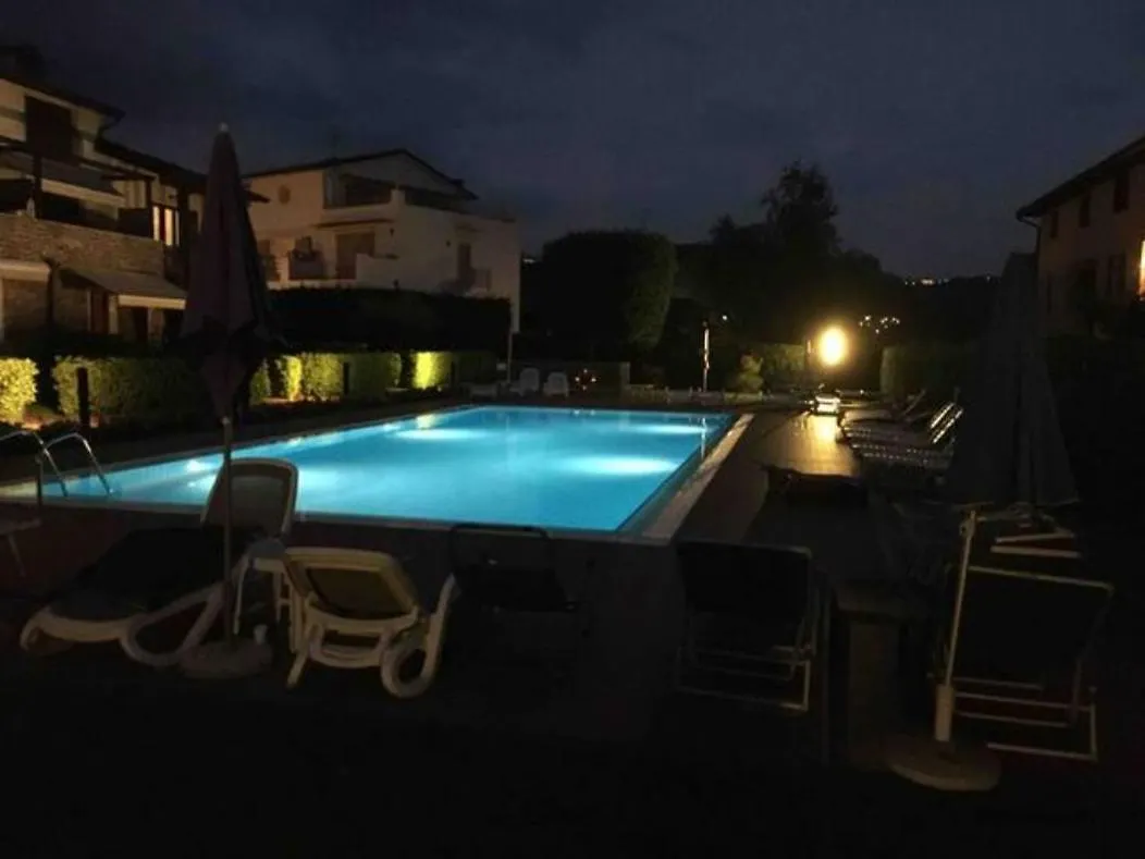 Holiday home Villa Con Ampio Giardino Esterno E Piscina Condominiale Garda  Italy